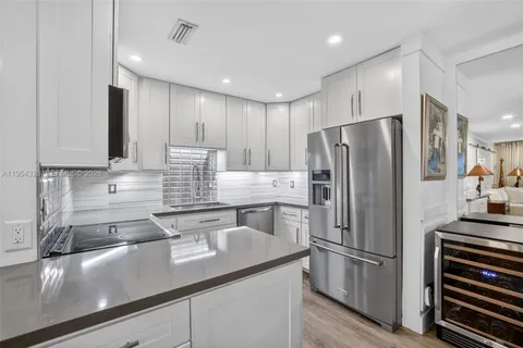 a view of a storage & utility room with a washer and dryer