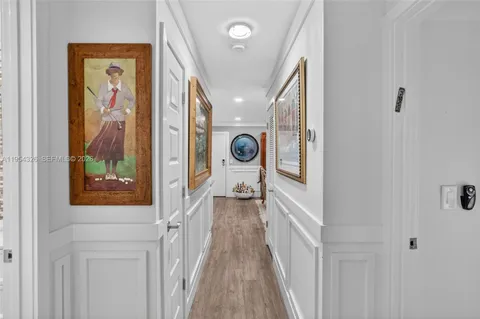 an aerial view of residential building and lake