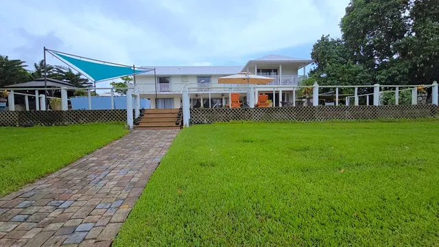 a view of entryway dining room and hall with wooden floor