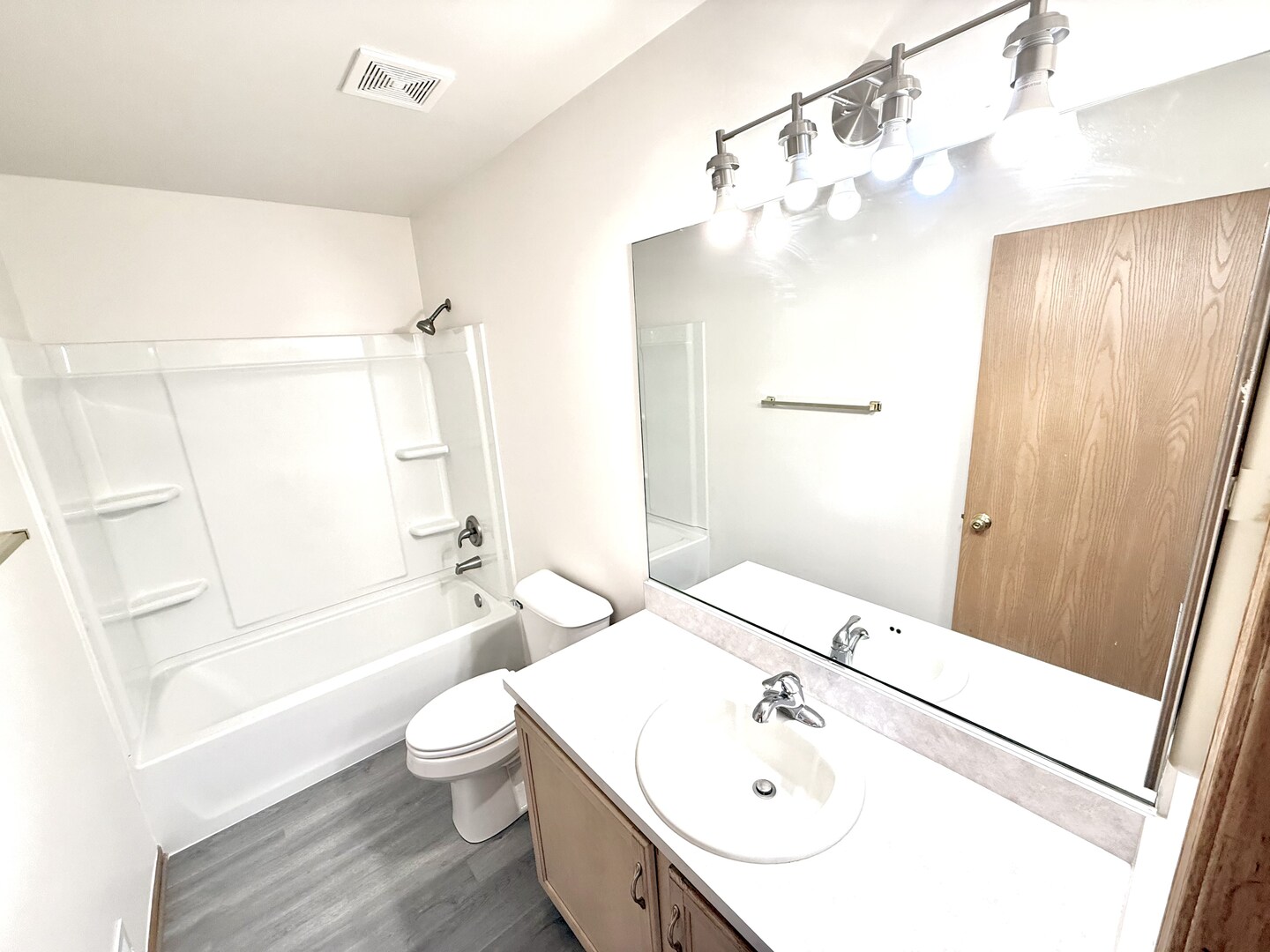 138 Mountain Laurel Court Romeoville, IL 60446 - Photo 17 of 26 a bathroom with a sink a toilet and shower