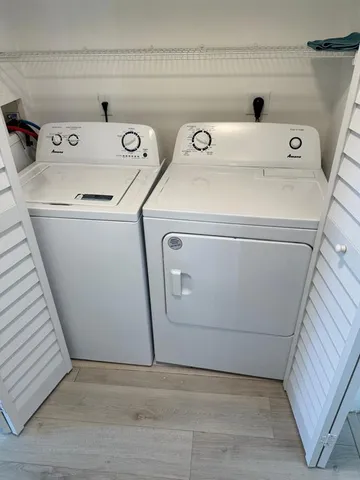 a bathroom with a toilet and shower