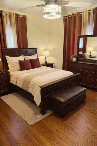 a view of a room with wooden floor and window