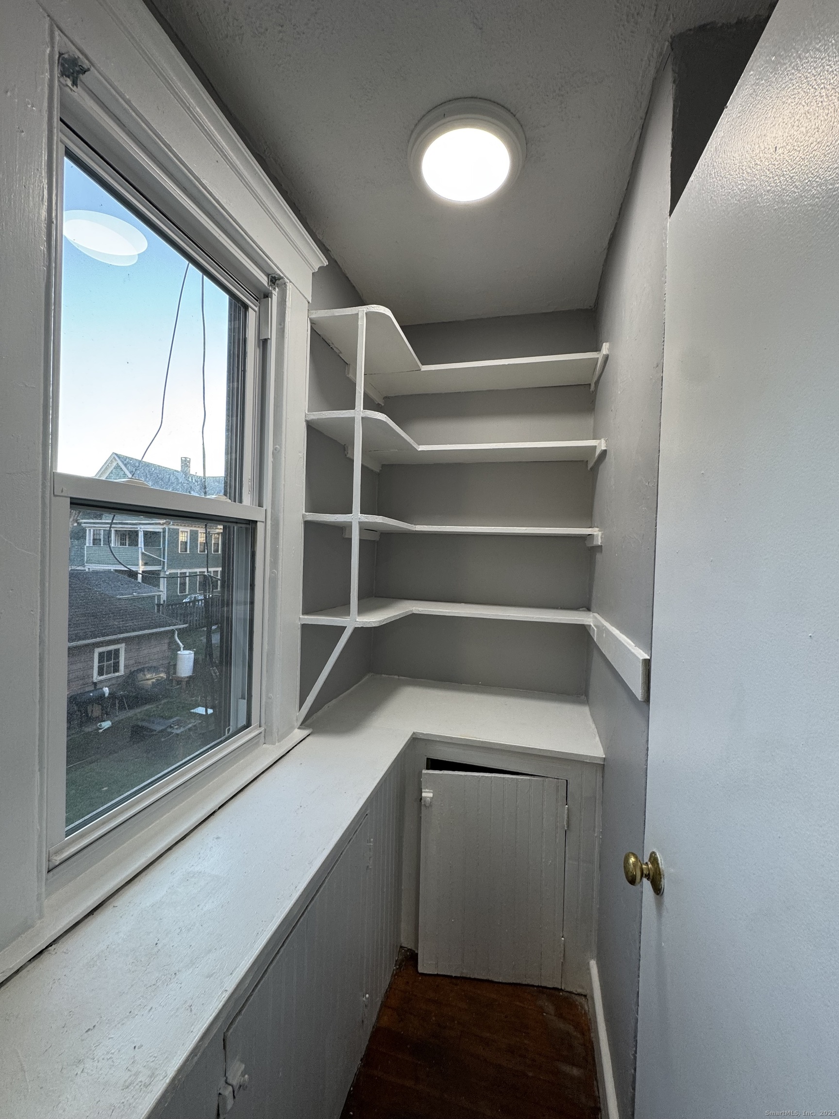 1528 Ella T Grasso Boulevard, Unit 2 New Haven, CT 06511 - Photo 4 of 10 a storage room with washer and dryer