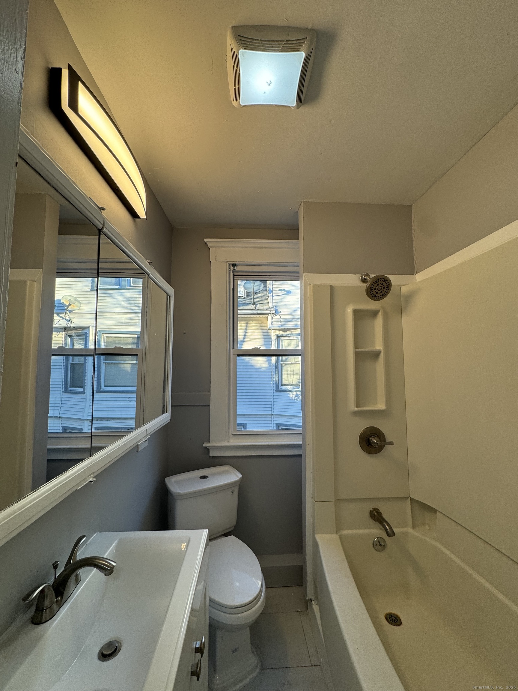 1528 Ella T Grasso Boulevard, Unit 2 New Haven, CT 06511 - Photo 6 of 10 a bathroom with a sink and a bathtub