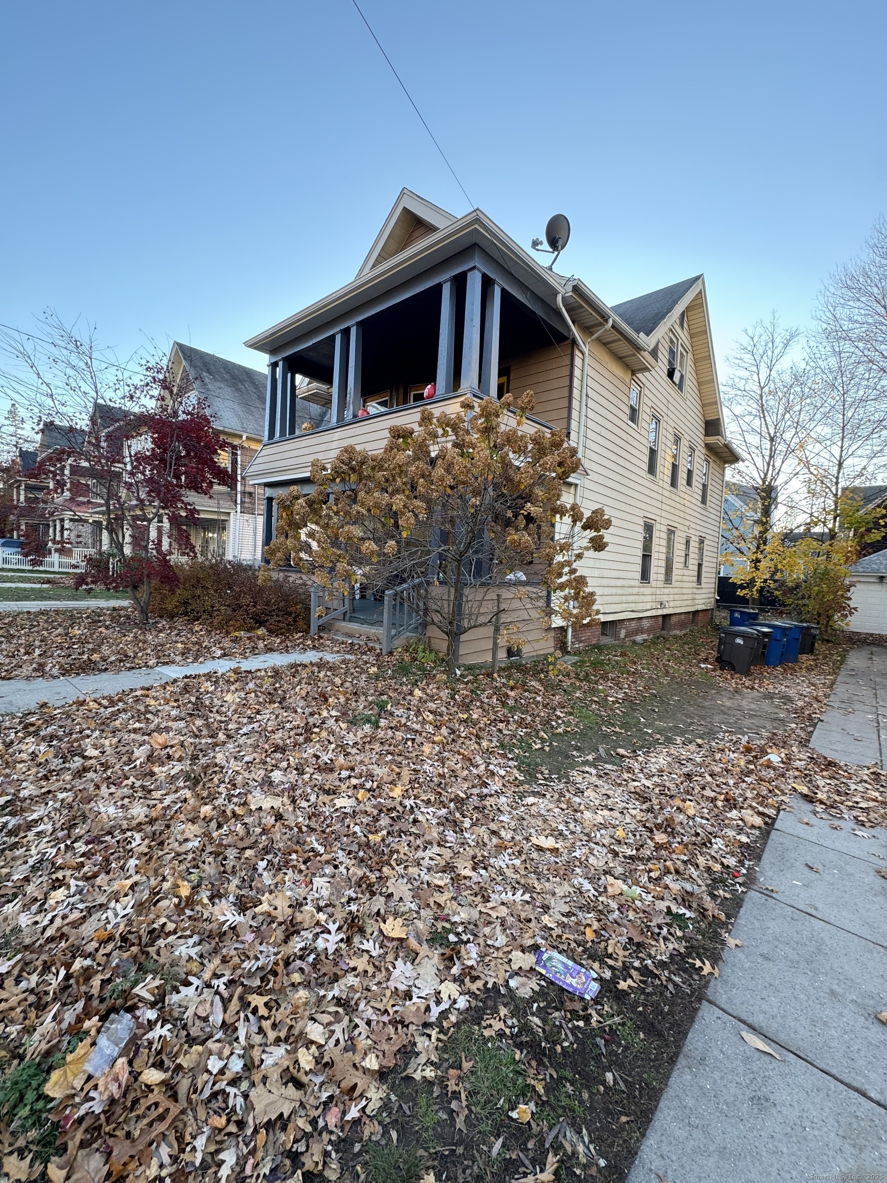 1528 Ella T Grasso Boulevard, Unit 2 New Haven, CT 06511 - Photo 10 of 10 a front view of a house with a yard