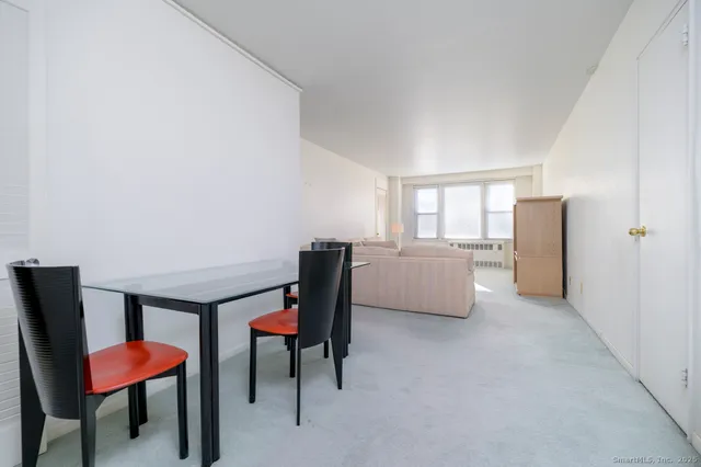 a room with furniture and a window