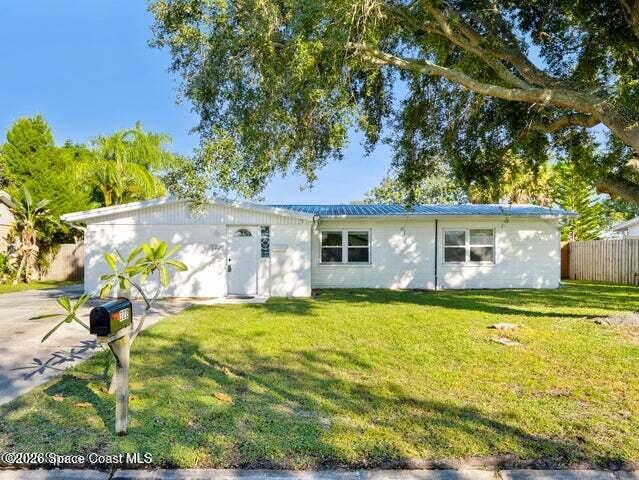 322 3rd Street Merritt Island, FL 32953 - Photo 2 of 37 a view of a house with swimming pool