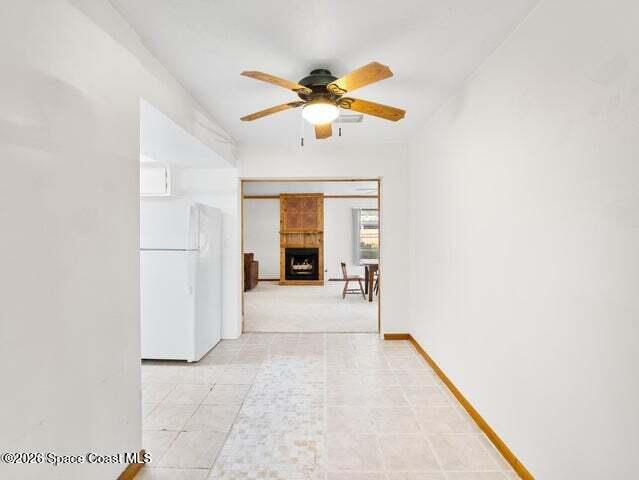 322 3rd Street Merritt Island, FL 32953 - Photo 26 of 37 a view of livingroom with hardwood floor and ceiling fan