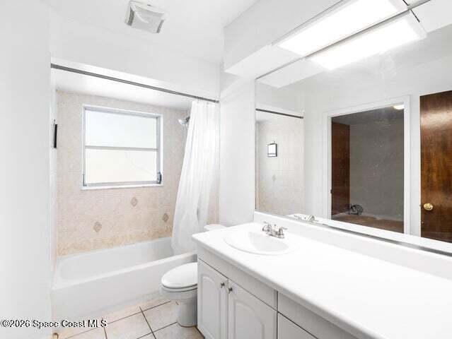 322 3rd Street Merritt Island, FL 32953 - Photo 31 of 37 a bathroom with a sink a toilet and shower
