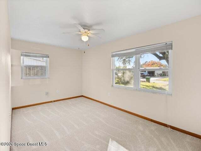 322 3rd Street Merritt Island, FL 32953 - Photo 32 of 37 a view of an empty room with a window