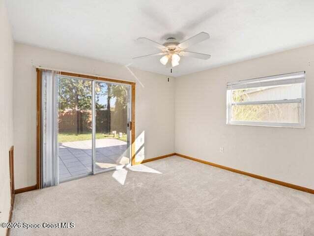 322 3rd Street Merritt Island, FL 32953 - Photo 33 of 37 a view of an empty room with a window