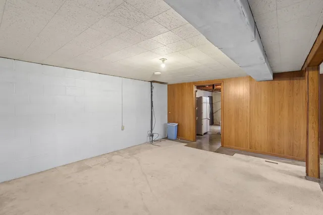 an empty room with closet area