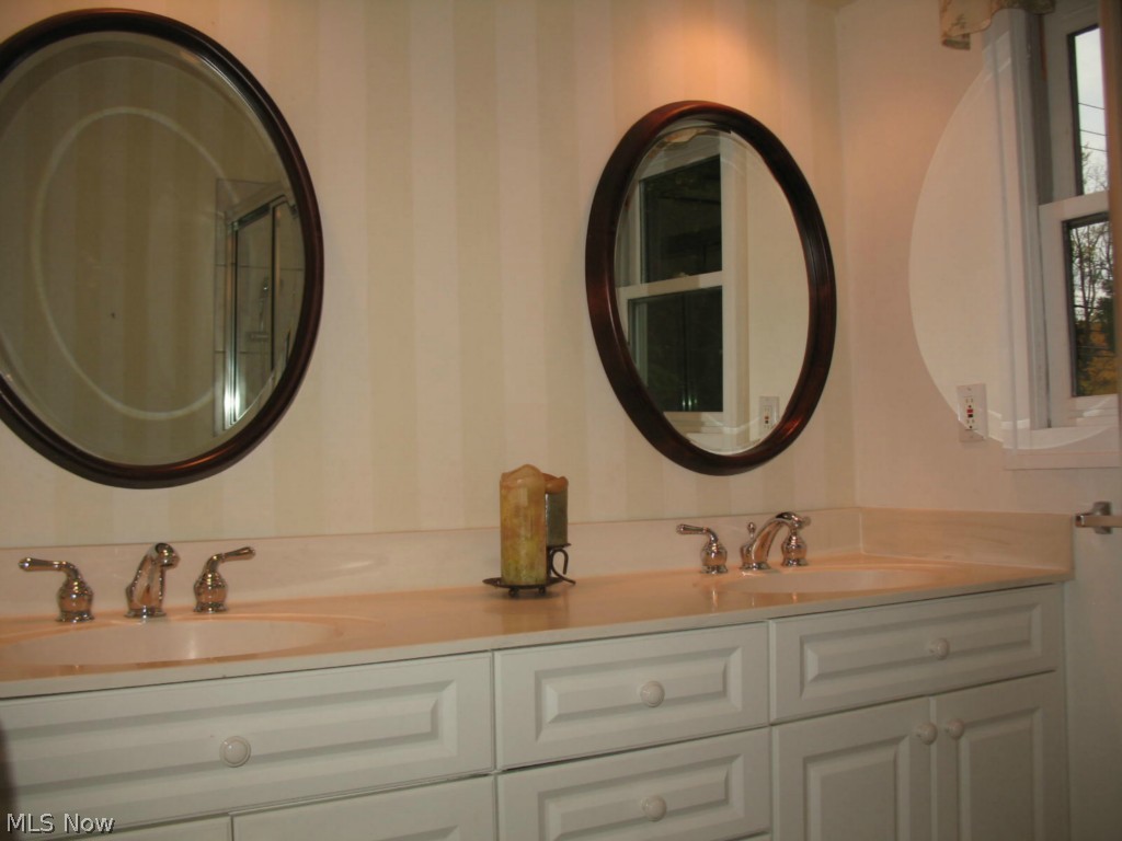 25912 Butternut Ridge Road North Olmsted, OH 44070 - Photo 13 of 25 Double sinks in the first floor bath room off the first floor bed room. This is only one of 3 full bath rooms.