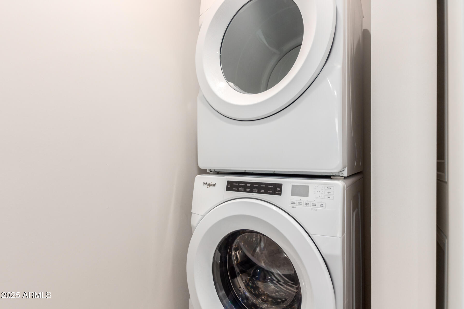7550 East Osborn Road, Unit 1002 Scottsdale, AZ 85251 - Photo 13 of 23 a close up view of a washer and dryer
