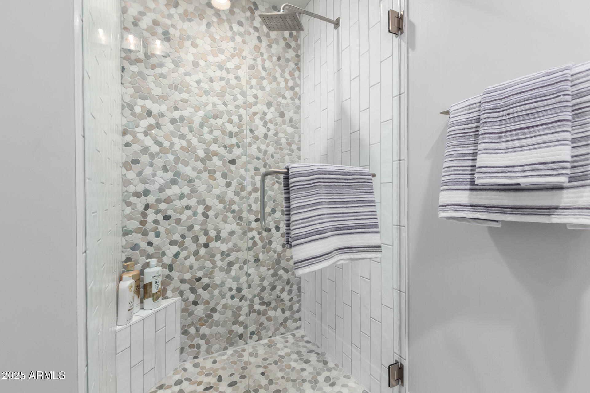 7550 East Osborn Road, Unit 1002 Scottsdale, AZ 85251 - Photo 9 of 23 a bathroom with a shower
