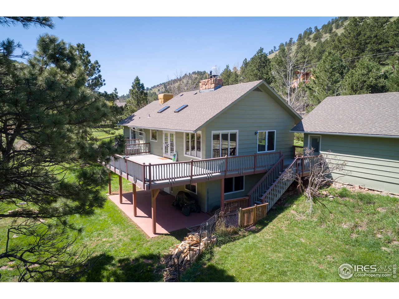 7172 Olde Stage Road Boulder, CO 80302 - Photo 1 of 35 a view of a house with a roof deck
