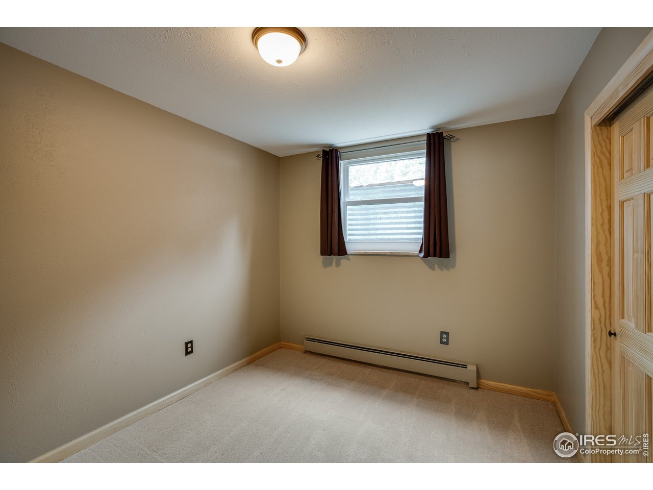 7172 Olde Stage Road Boulder, CO 80302 - Photo 23 of 35 a view of an empty room with a window
