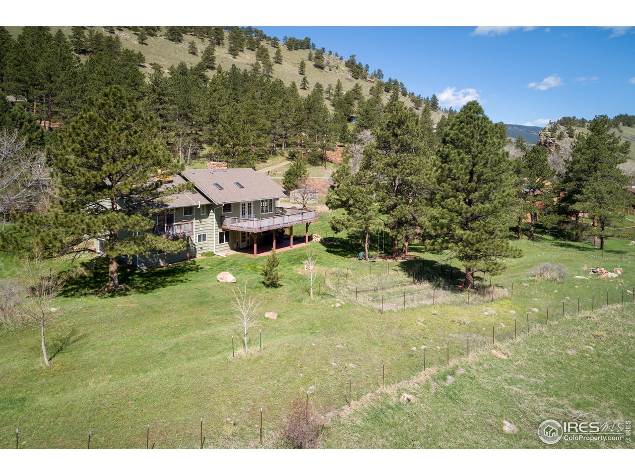 7172 Olde Stage Road Boulder, CO 80302 - Photo 29 of 35 a view of a house with a yard