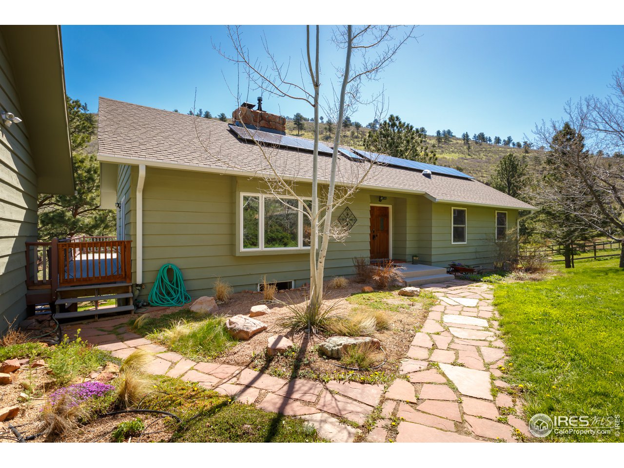 7172 Olde Stage Road Boulder, CO 80302 - Photo 3 of 35 a view of a house with a patio