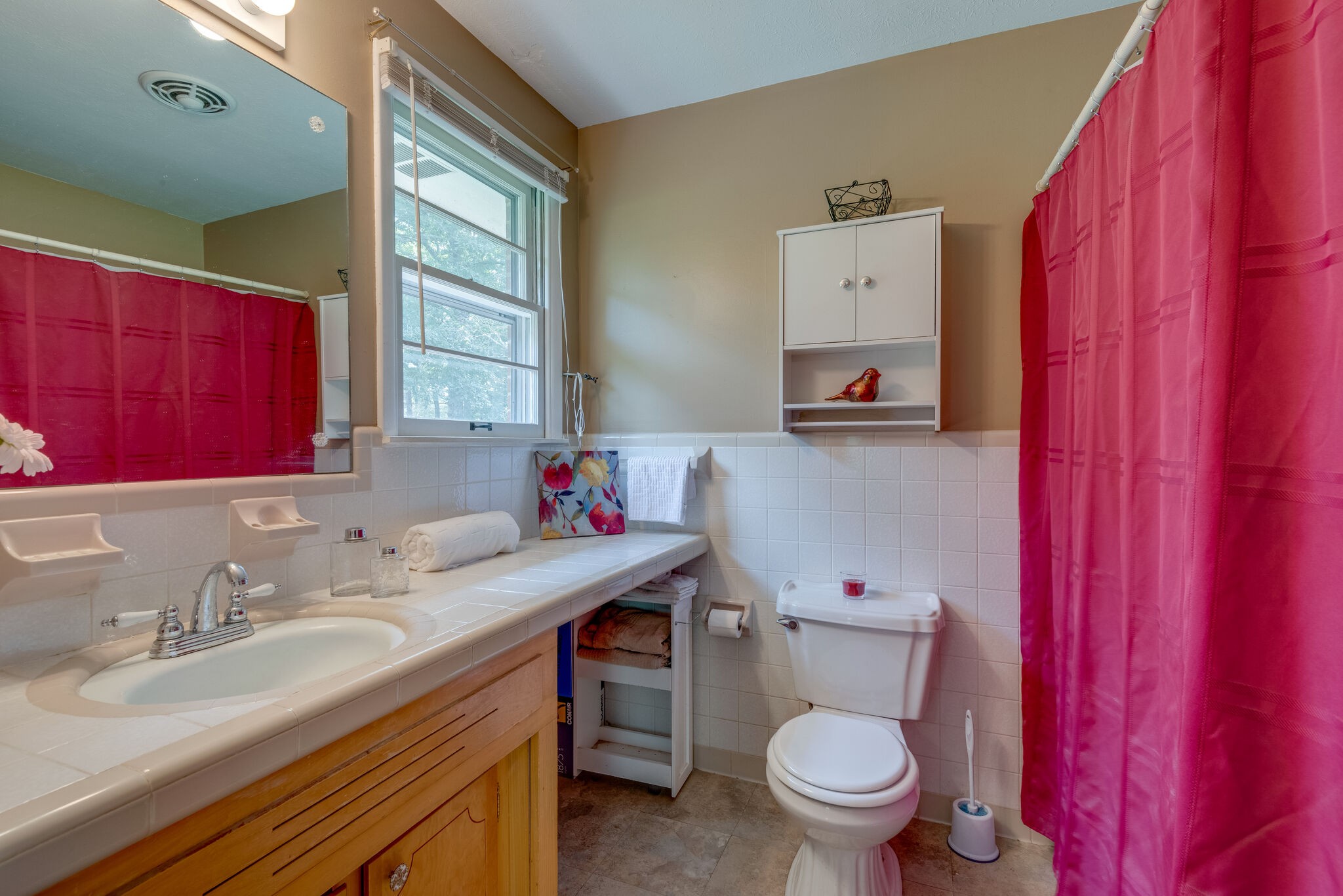 101 Duke Road Dickson, TN 37055 - Photo 16 of 30 a bathroom with a granite countertop toilet sink and mirror