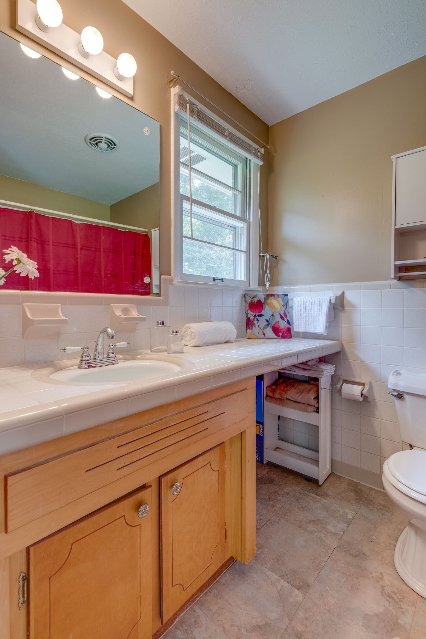 101 Duke Road Dickson, TN 37055 - Photo 17 of 30 a bathroom with a sink and a mirror
