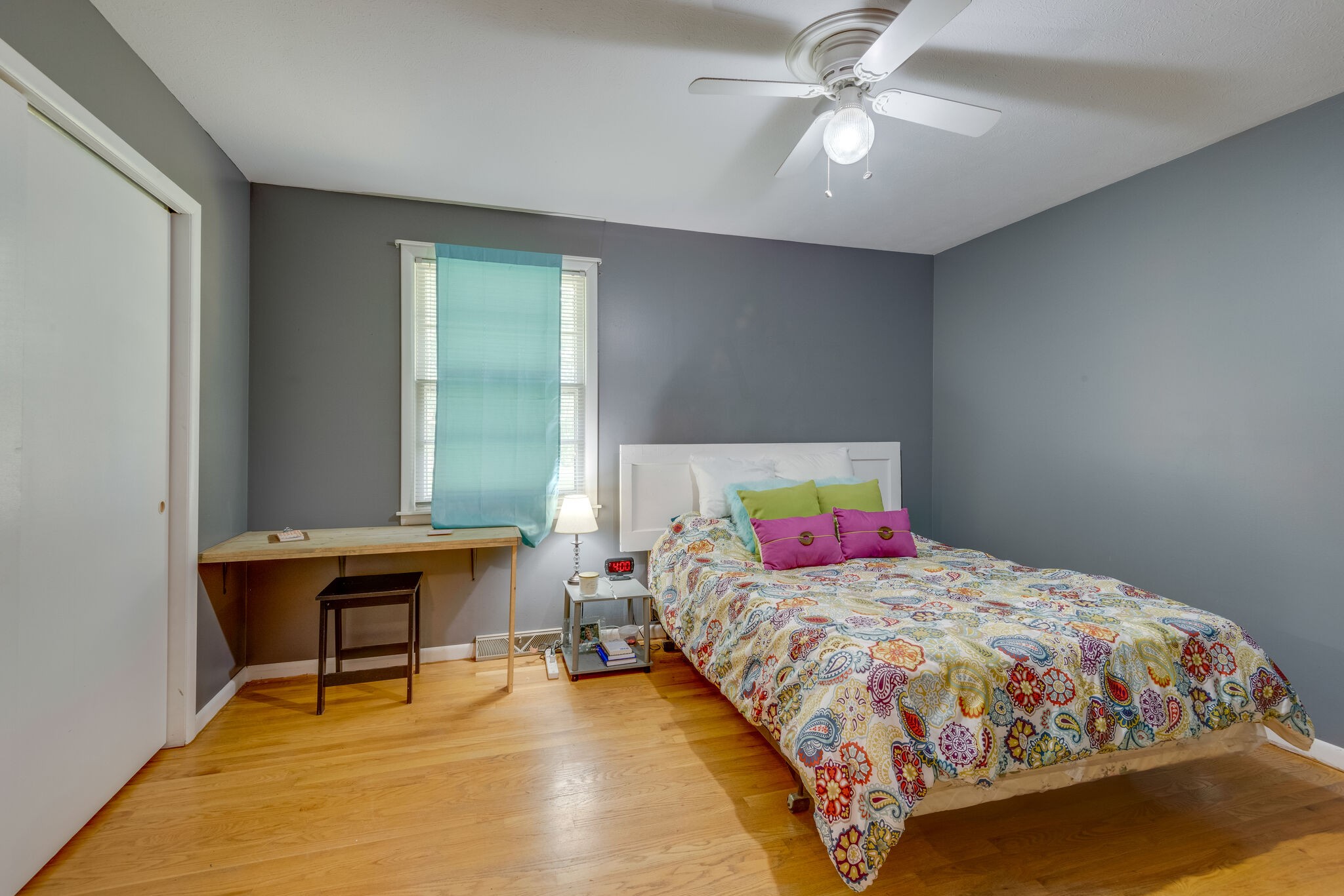 101 Duke Road Dickson, TN 37055 - Photo 18 of 30 a bedroom with a bed and a chandelier