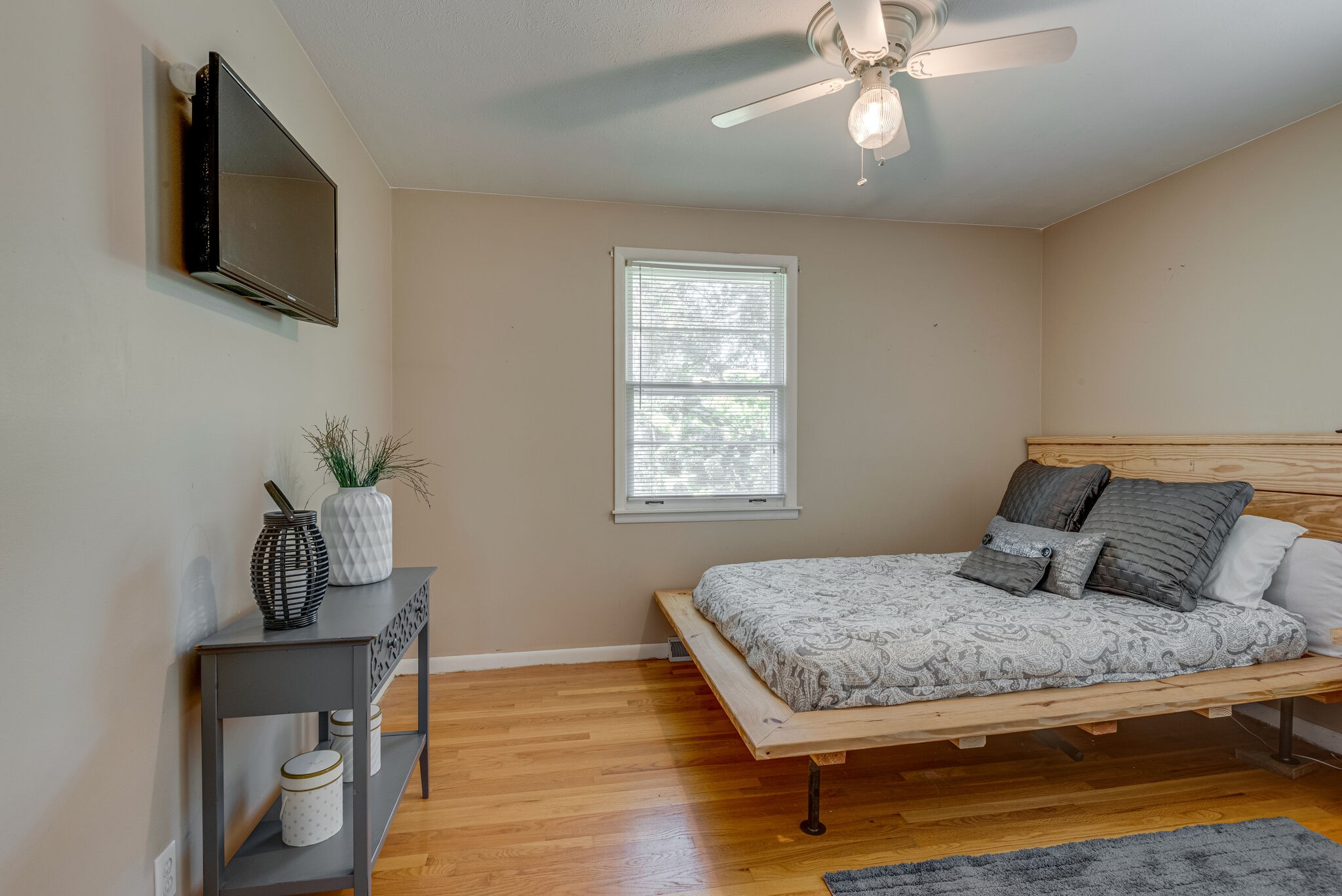 101 Duke Road Dickson, TN 37055 - Photo 19 of 30 a bedroom with a bed and flat screen tv