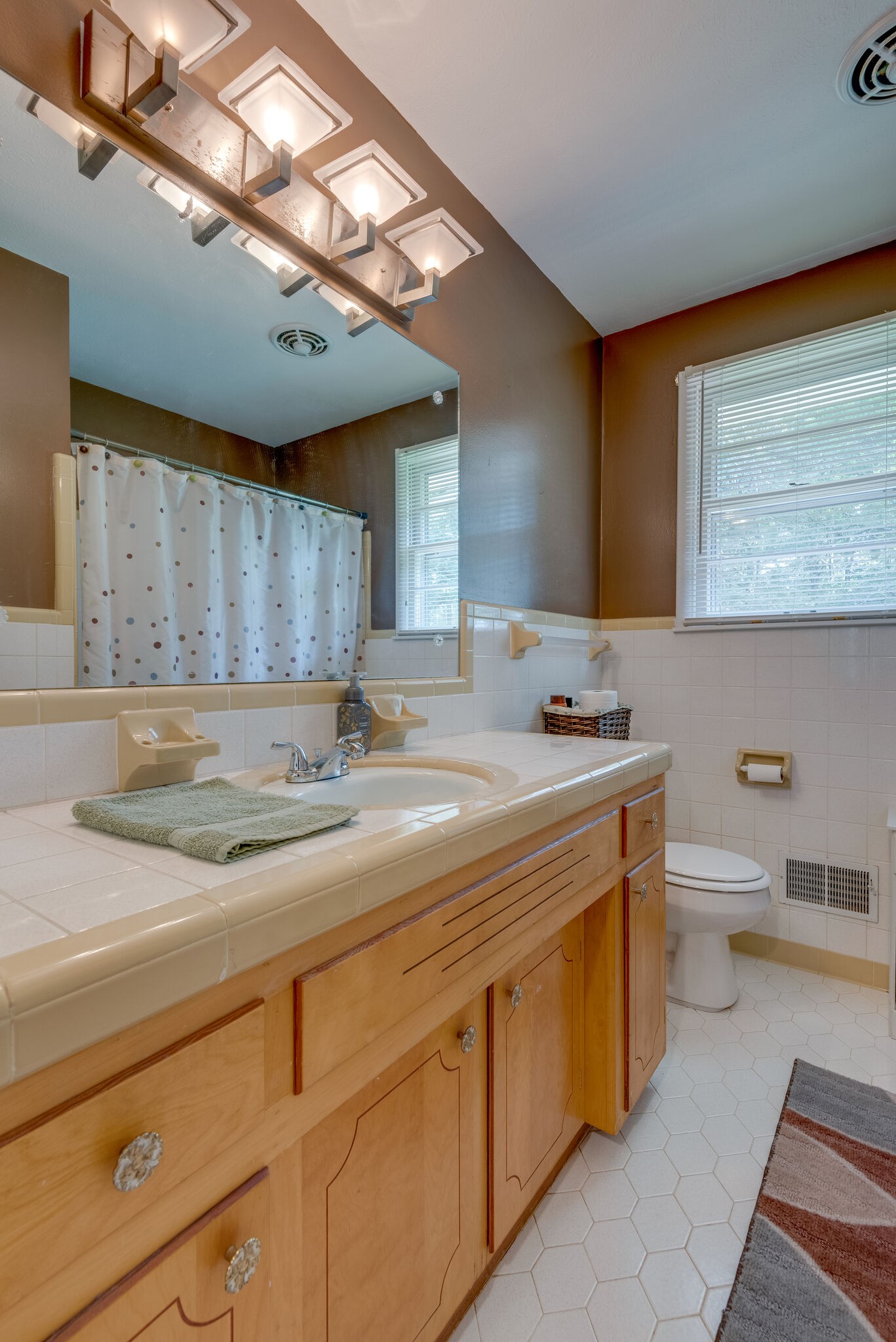 101 Duke Road Dickson, TN 37055 - Photo 20 of 30 a bathroom with a granite countertop sink and a toilet