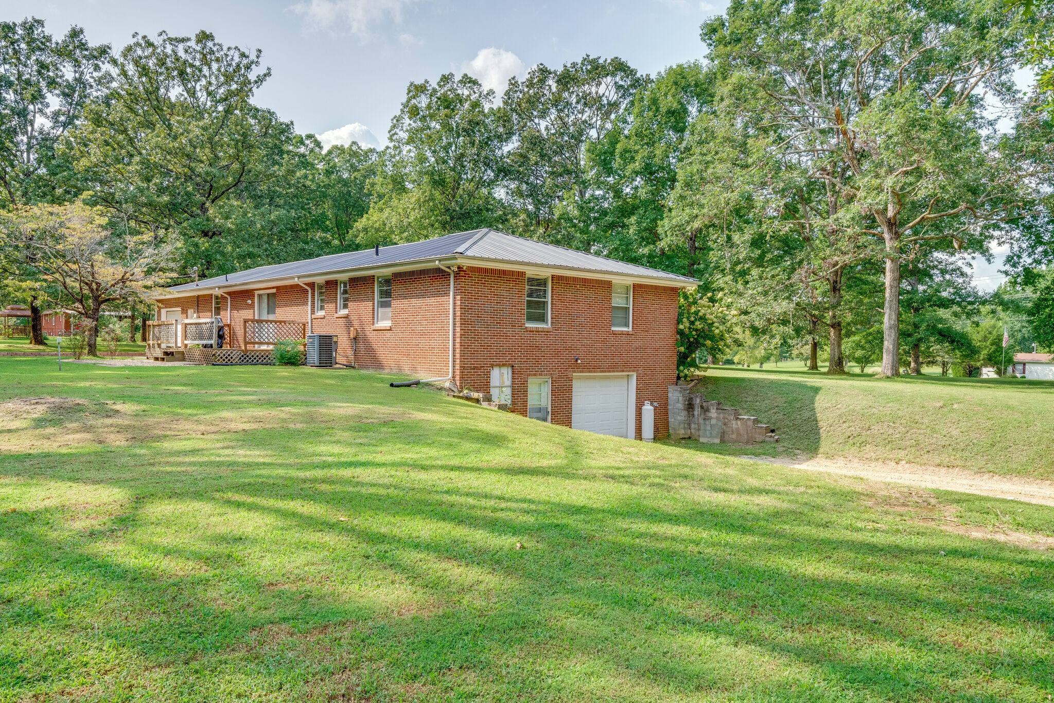 101 Duke Road Dickson, TN 37055 - Photo 26 of 30 a view of a house with a yard