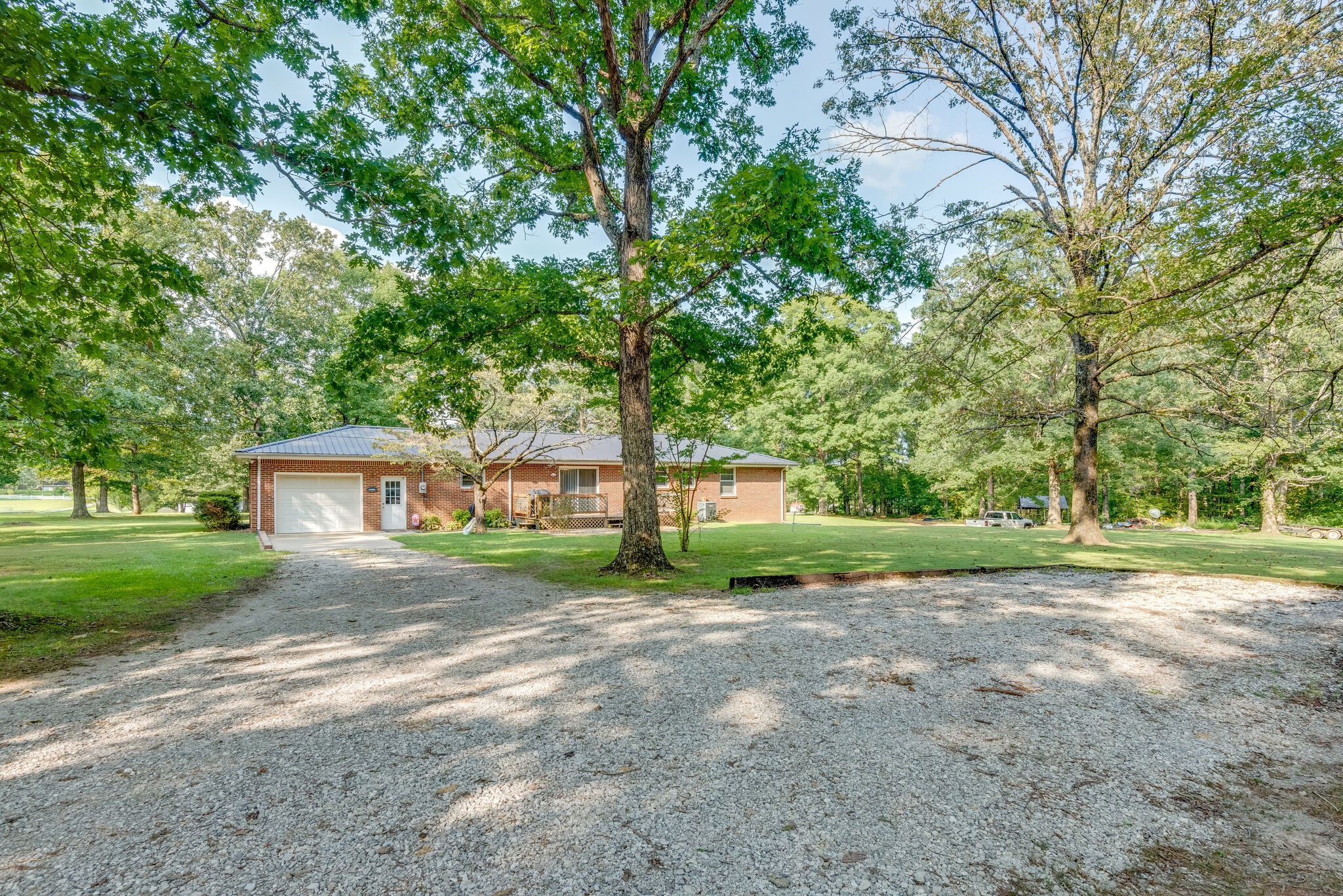 101 Duke Road Dickson, TN 37055 - Photo 27 of 30 a view of a house with a yard and large trees