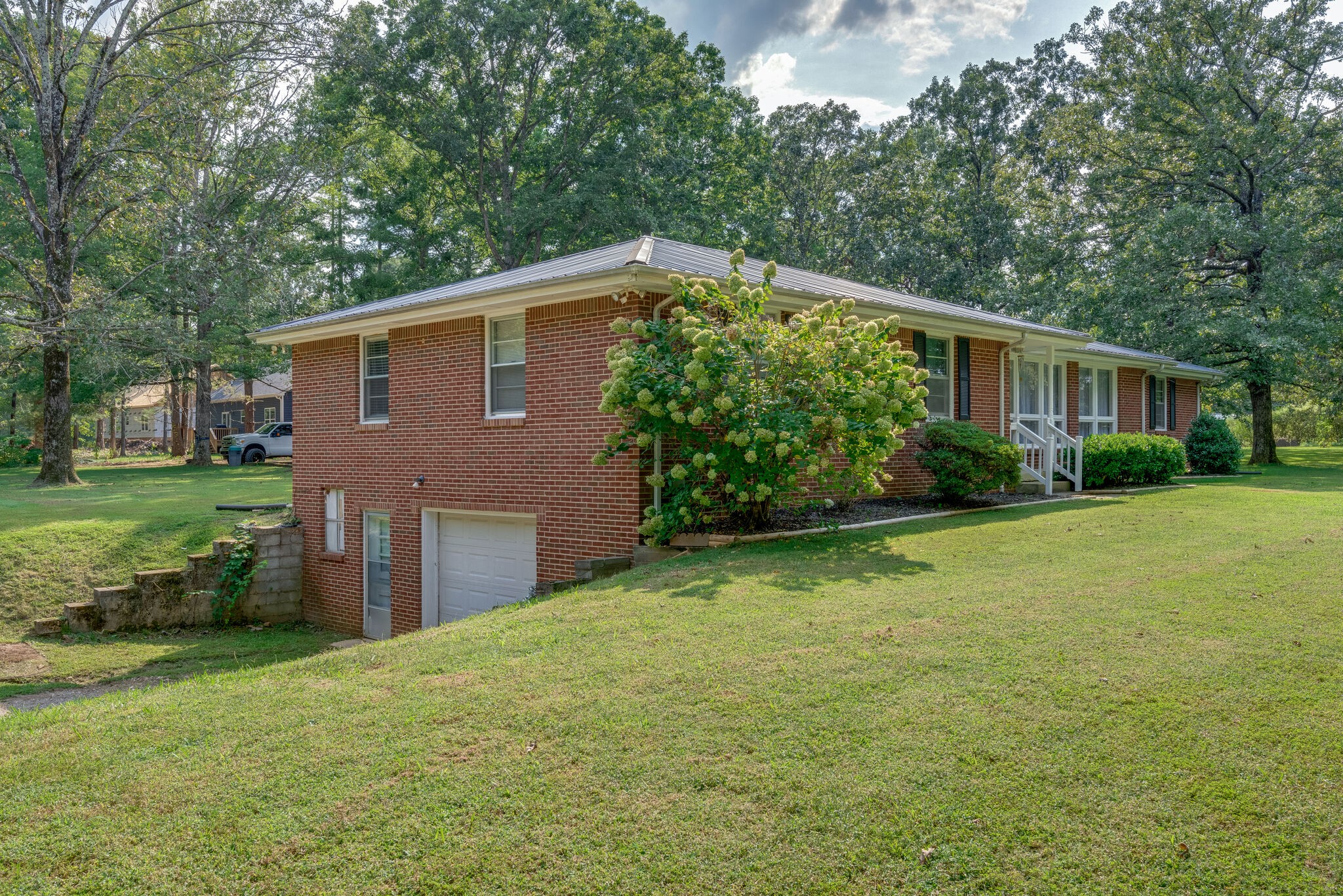 101 Duke Road Dickson, TN 37055 - Photo 3 of 30 a front view of a house with garden