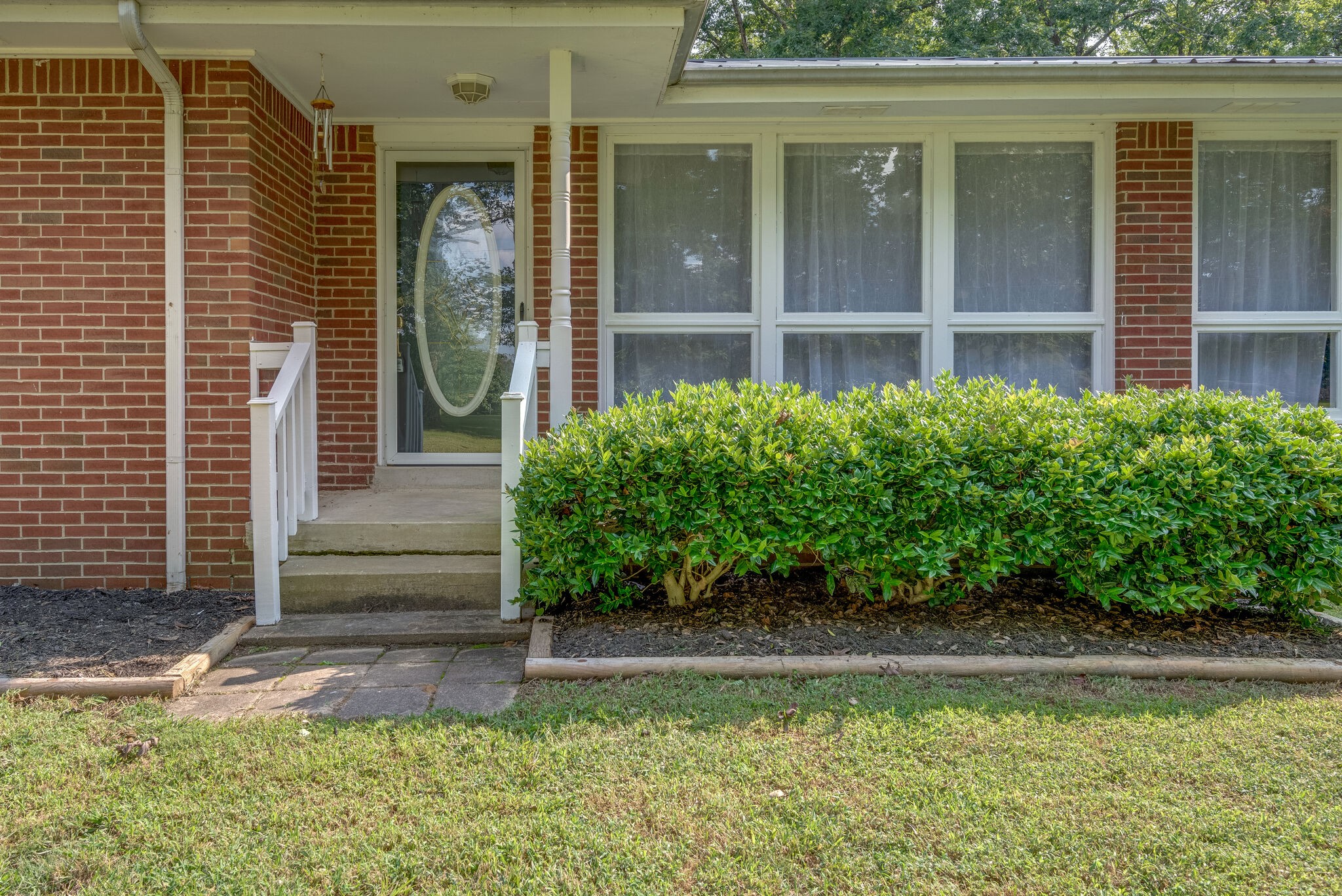 101 Duke Road Dickson, TN 37055 - Photo 4 of 30 a front view of a house with a yard