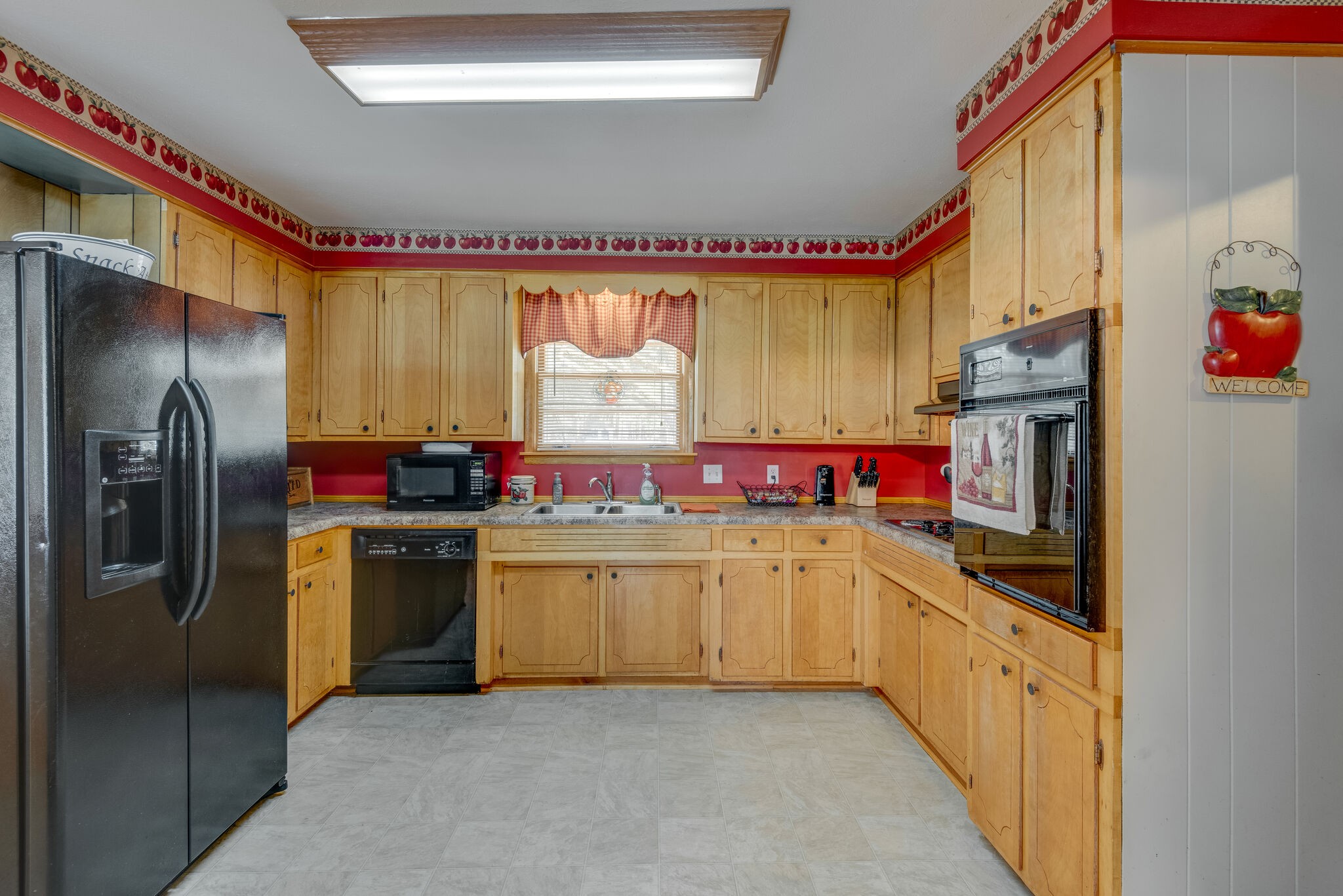 101 Duke Road Dickson, TN 37055 - Photo 9 of 30 a kitchen with stainless steel appliances granite countertop a refrigerator and a stove