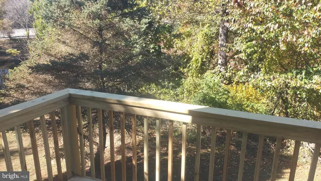 a view of a wooden fence from a window