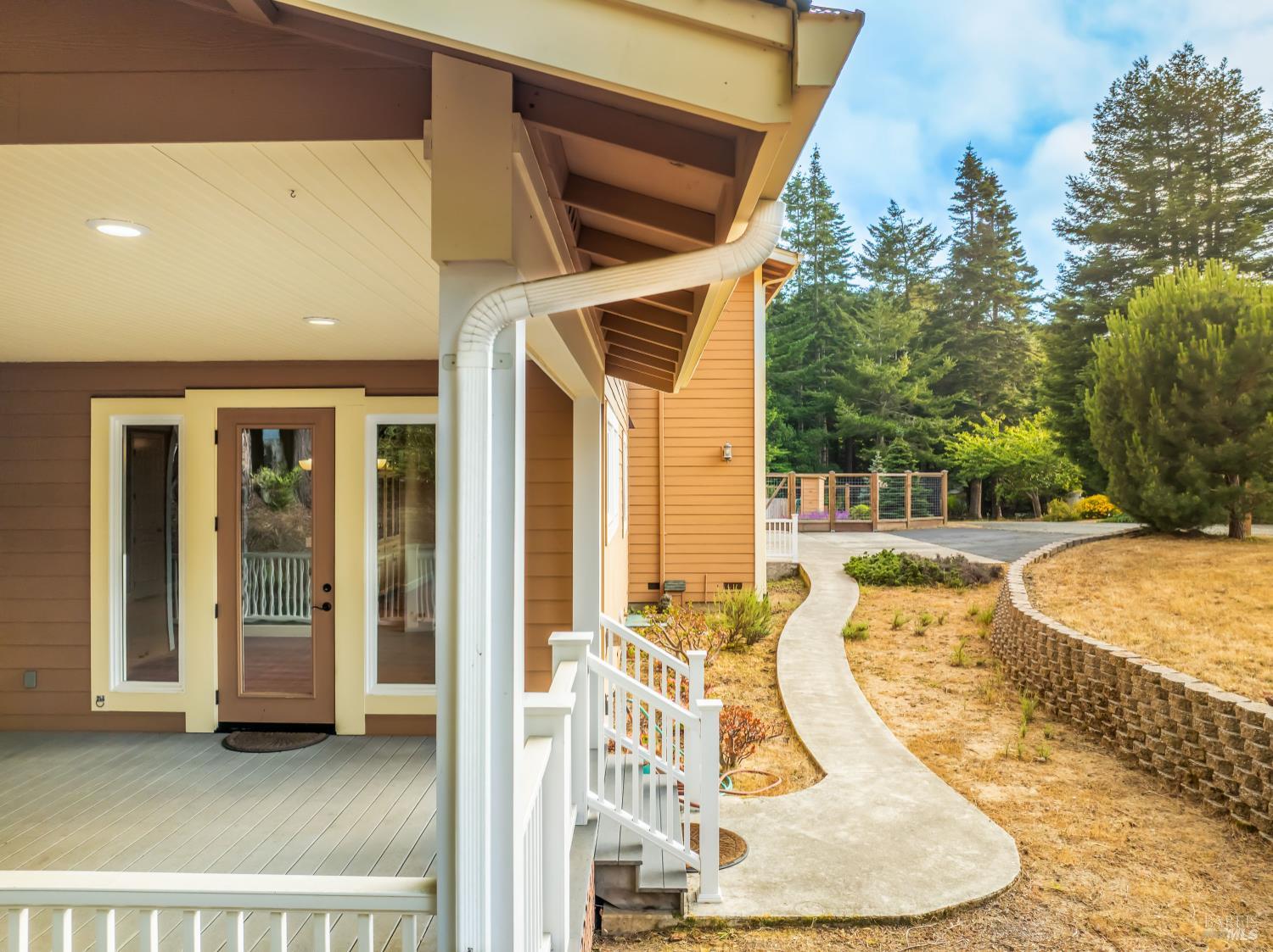 16611 Pearl Ranch Road Fort Bragg, CA 95437 - Photo 53 of 71 a view of a swimming pool with an outdoor seating