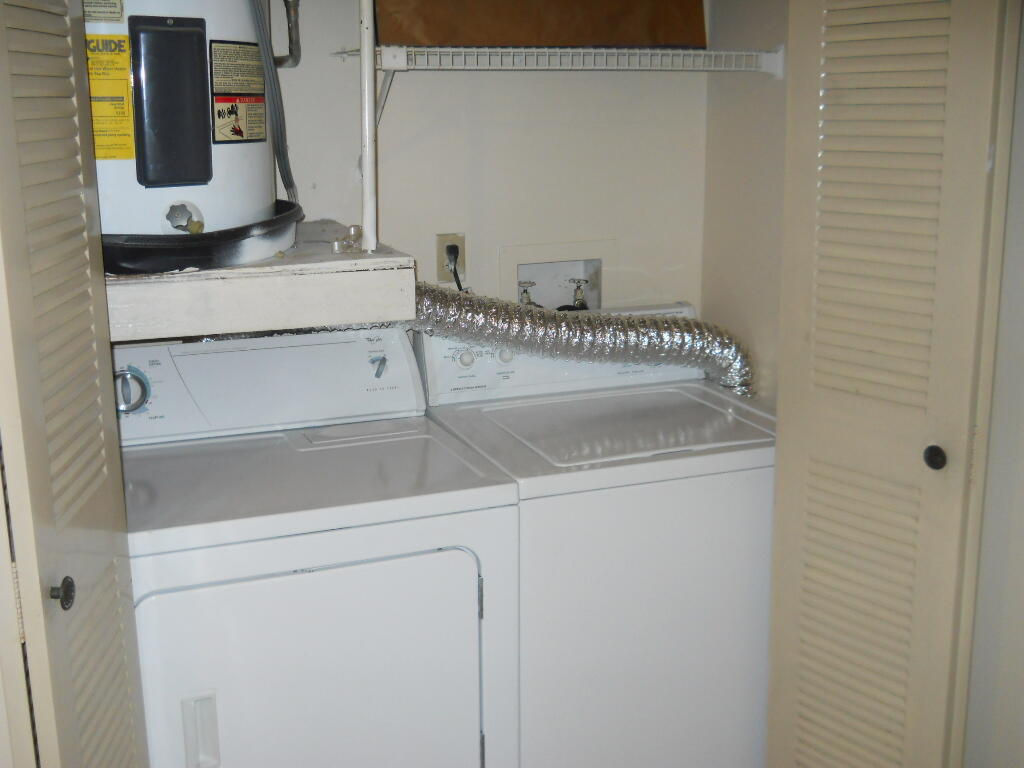 1915 Lavers Circle, Unit E206 Delray Beach, FL 33444 - Photo 11 of 17 washer dryer