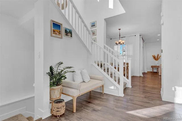 a view of entryway with wooden floor