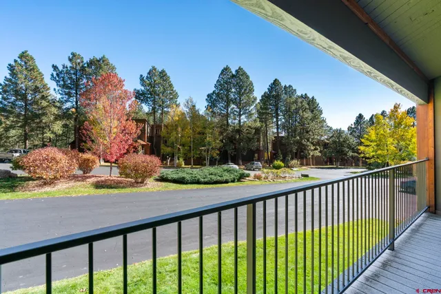 a view of a street from a balcony