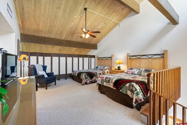 a bed room with a bed and a couch