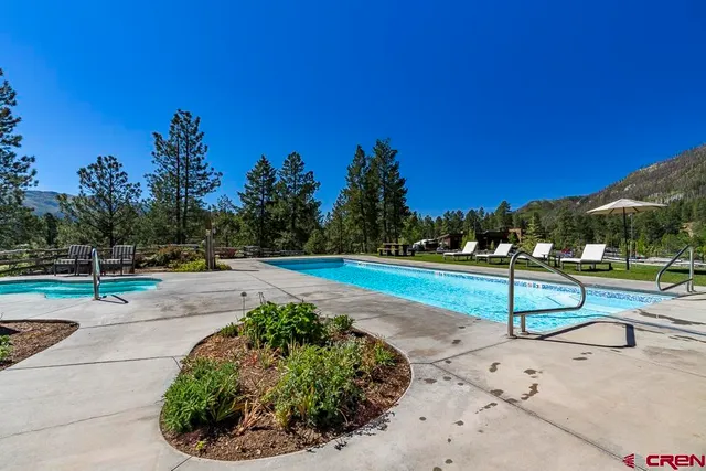 a view of a park with swings and slides