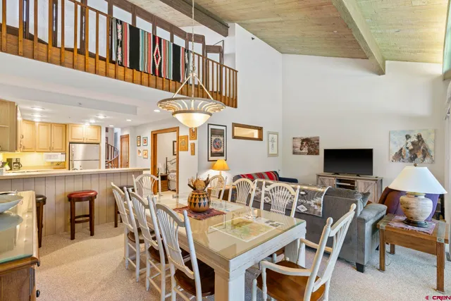a view of a dining room with furniture
