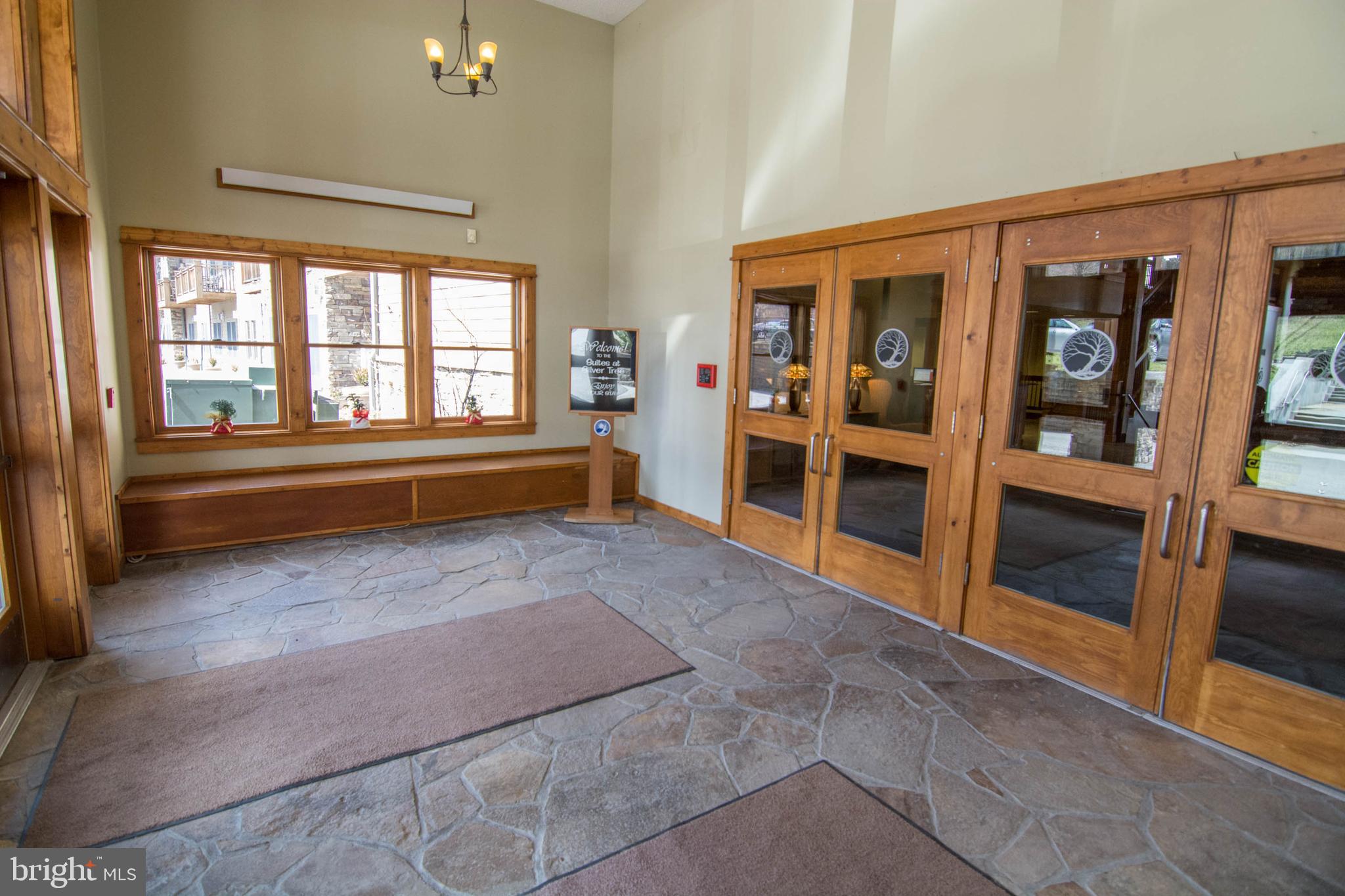 565 Glendale Road, Unit 103B Oakland, MD 21550 - Photo 20 of 53 a view of an empty room with a window