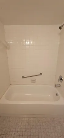 a bathroom with a bathtub