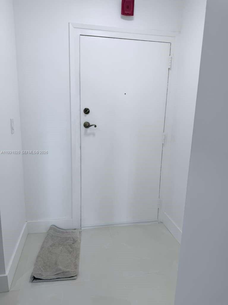 160 Southwest 30th Avenue, Unit 104A Miami, FL 33135 - Photo 17 of 32 a bathroom with a shower