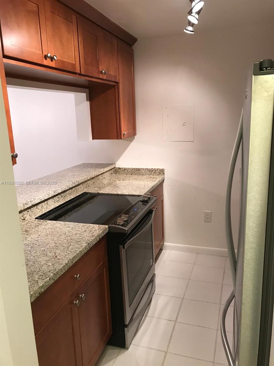 160 Southwest 30th Avenue, Unit 104A Miami, FL 33135 - Photo 19 of 24 a utility room with washer and dryer