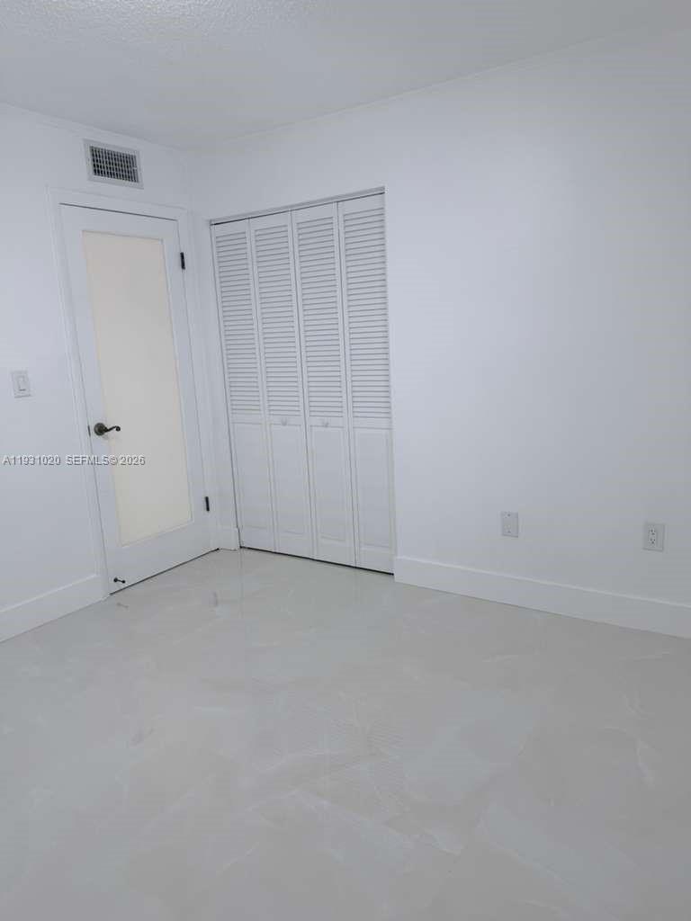 160 Southwest 30th Avenue, Unit 104A Miami, FL 33135 - Photo 28 of 32 a view of an empty room