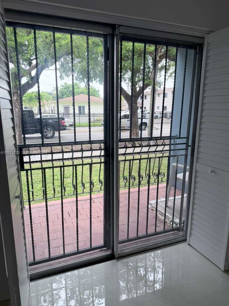 160 Southwest 30th Avenue, Unit 104A Miami, FL 33135 - Photo 29 of 32 a view of a balcony