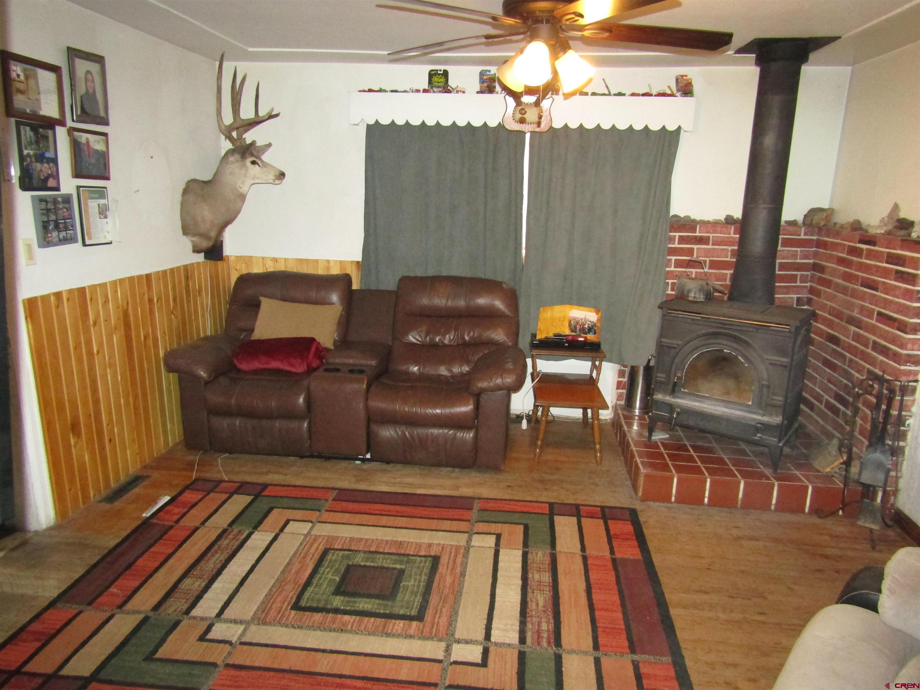 412 Lariat Road Monte Vista, CO 81144 - Photo 5 of 12 a living room with furniture