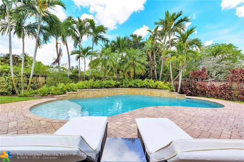Your "tropical oasis." (Saltwater Heated Pool)