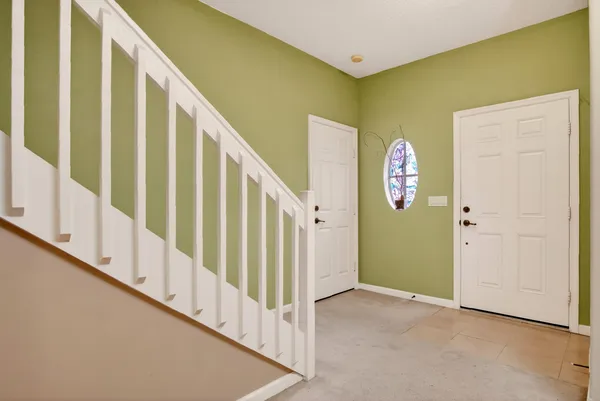 a view of a hallway with entryway